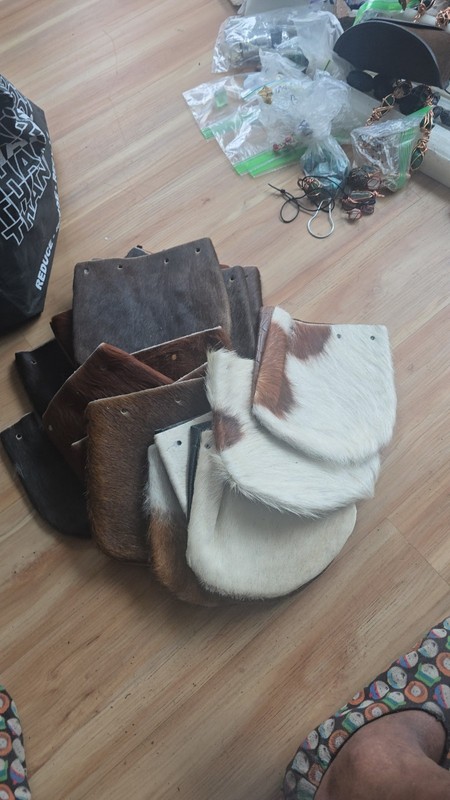 COWHIDE POUCHETTE LOT ....
