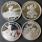 Lot of Four Christmas 1oz Silver Rounds