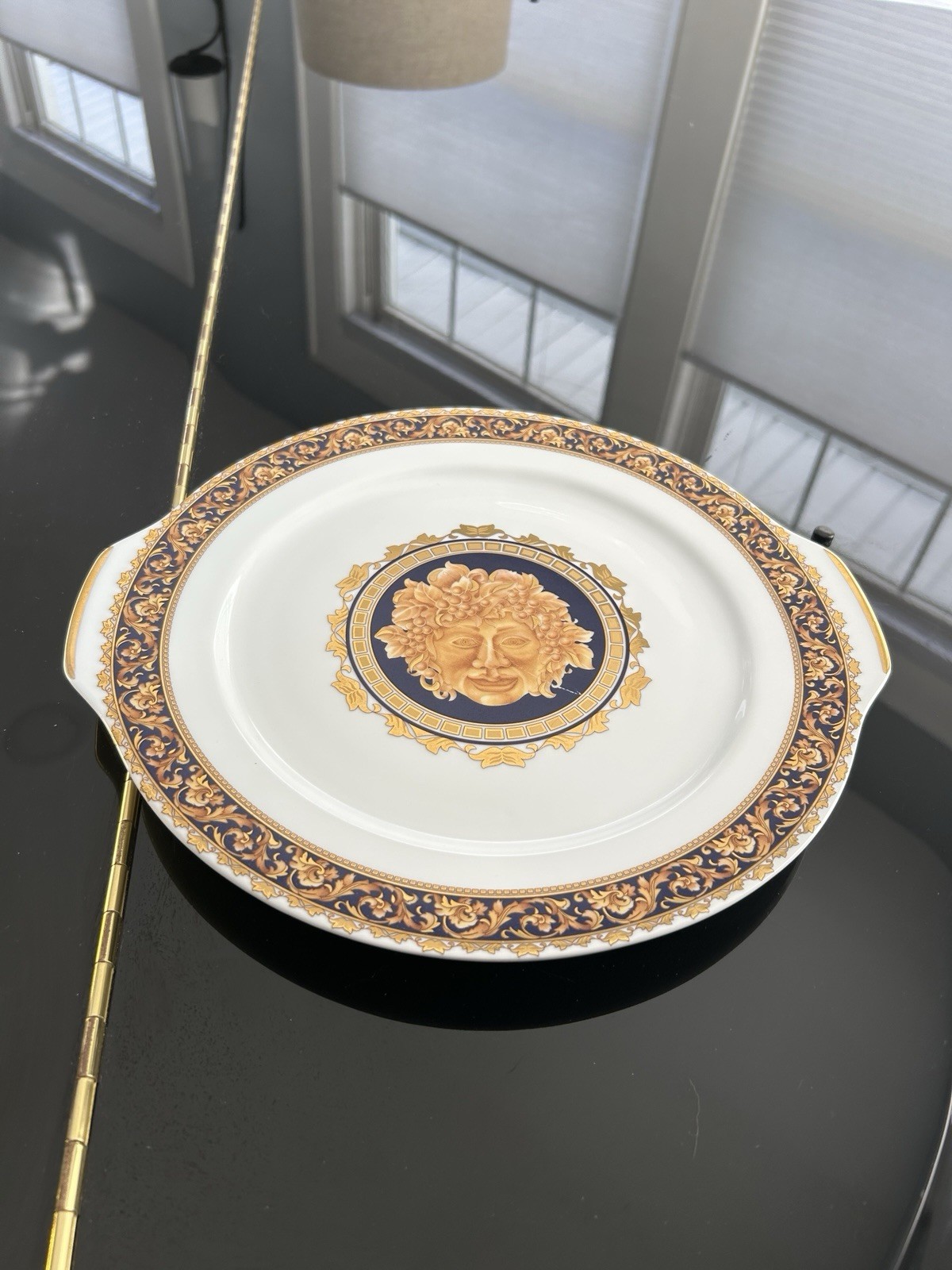 Vintage Limoges porcelain platter with Bacchus motif and ornate gold trim 