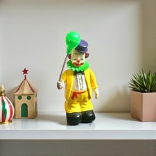 Vintage Mechanical Clown Produced by New Bright Industrial Co., Ltd. en 1991.