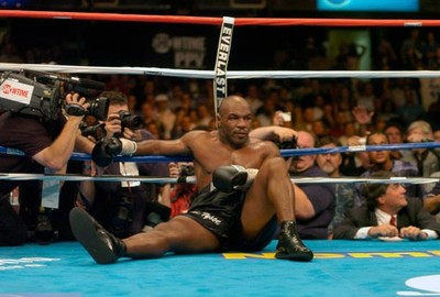 Mike Tyson sitting on the canvas after he was knocked down by Dann- Old Photo 1