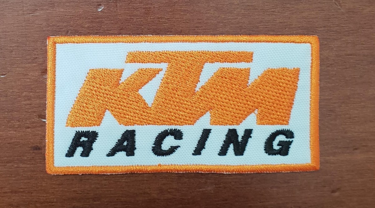 Patch Toppa - Lettera e - Tgl circa 6cm - 21506 Arancio-Verde