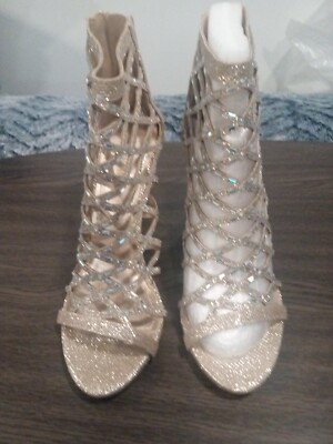 high heel open shoes new size 7.5  colors gold & silver   in good condition  