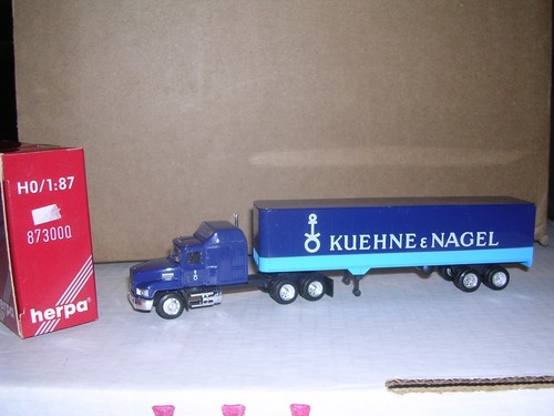 HERPA #873000 Mack cabina para dormir con remolque de caja de 40' "Kuehne & Nagel" azul H.O.1:87 | Zustand: New