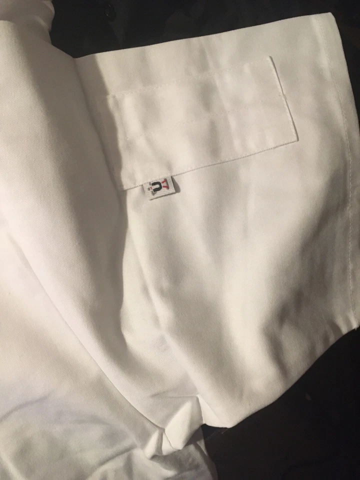 Abrigo de Chef Utilitario Uncommon Threads 10 Clásico Botón Manga Larga Mediano Blanco Foto 3 de 4