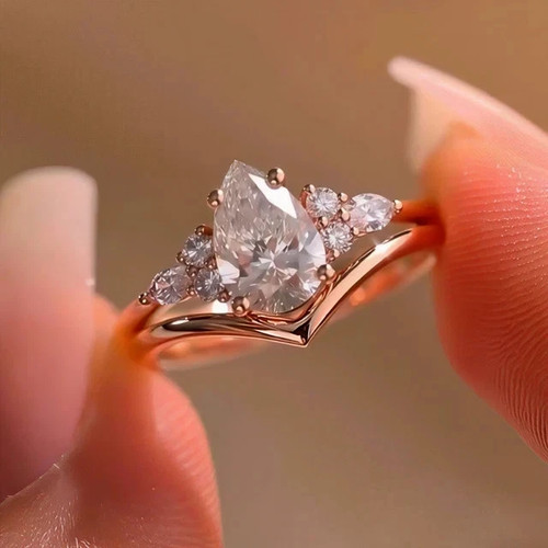 14K Rose Gold Plated 2.70 CTW Pear Cut D/VVS1 Moissanite Matching Band Ring Set - Picture 3 of 9