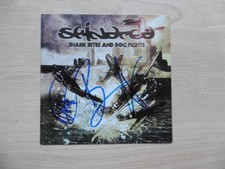 Skindred autographs signed CD booklet "Shark Bites and Dog Fights"