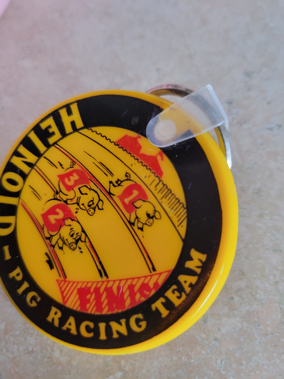 Heinold Pig Racing Team Keychain Vintage Commodities Inc Marketing Yellow