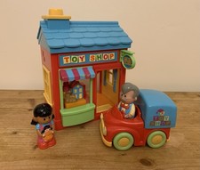 ELC Happyland Village Toy Shop with Toys, Car & 2 Figures (girl with doll)