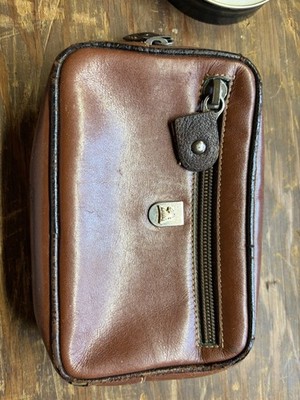 Mark Cross brown leather wallet with gold-toned chess piece emblem
