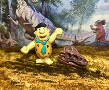 Figura de colección Fred Picapiedra PVC Sonrics México 1994 miniatura hueso de dinosaurio