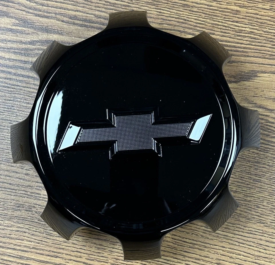 Комплект оригинальных глянцевых черных центральных колпаков 7 дюймов для Chevrolet Silverado 2500, 3500 23378307 - Изображение 2 из 2