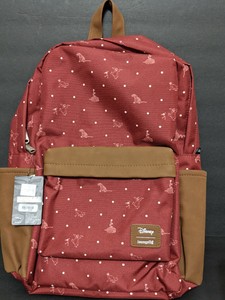 red polka dot backpack