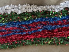 Christmas tinsel strands in Christmas colors, various sized strands