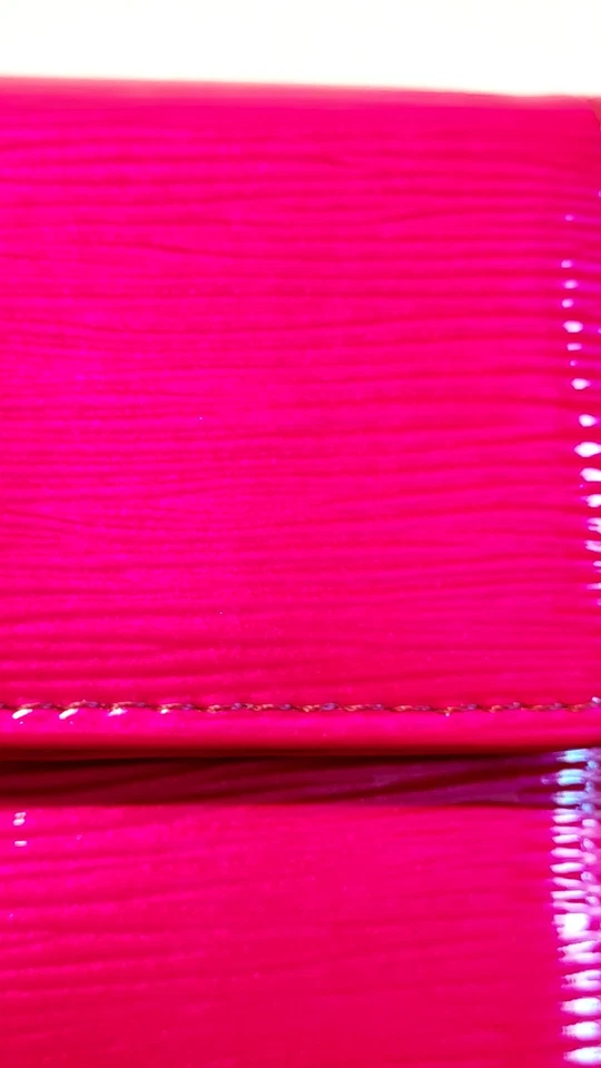 Cartera clutch Kenneth Cole Reaction roja usada Foto 4 de 4