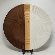 Nelson McCoy Sandstone Chop Plate, a 12 3/8-inch round stoneware platter.