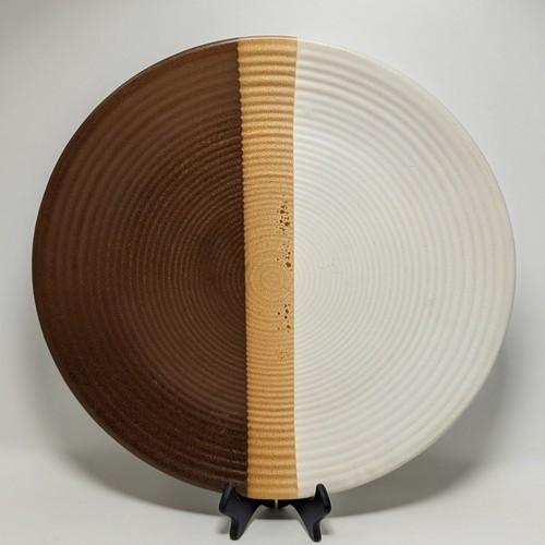 Nelson McCoy Sandstone Chop Plate, a 12 3/8-inch round stoneware platter.