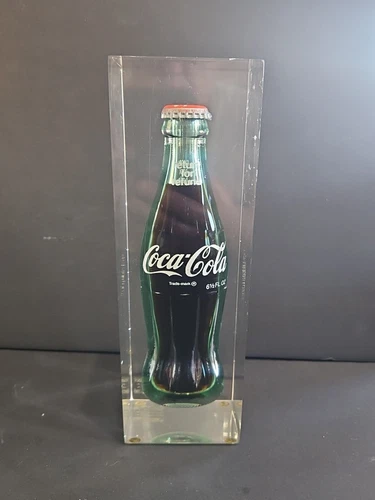 VINTAGE 6.5 FLUID OZ COKE BOTTLE ENCASED IN SUSPENDED LUCITE CASE