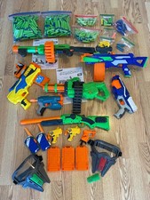 HUGE LOT OF NERF GUNS 10 , AMMO 150 , WALKIE TALKIES, FACE SHIELDS, AMMO CLIPS