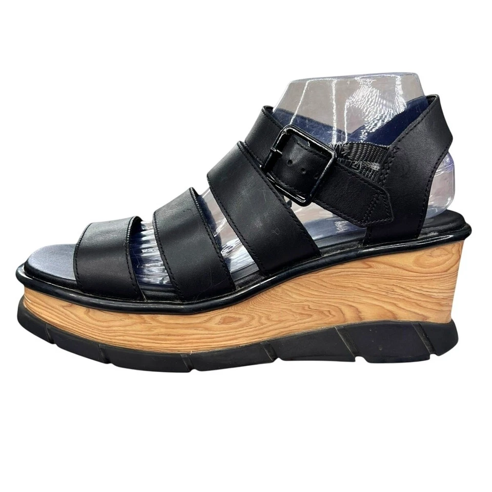 Sandalia de cuña Sorel Joanie III de cuero negro para mujer talla US 9,5 Foto 3 de 4