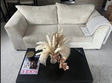 A stylish, modern two-seater corduroy sofa pet free smoke free home 