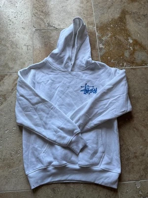 sweat à capuche stussy taille M blanc et bleu en très bon état - Photo 1/2