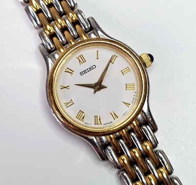 Seiko Oval Women\'s Two Tone Silver and Gold Wrist  Sunburst Dial Watch 1N00-6F80 Vintage Seiko 1N00 Ladies Gold Silver Tone Circle Dress  main image 3