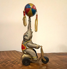 Vintage Pre-1970 Circus Tin Wind-Up Elephant Scooter Toy Balancing Ball