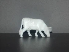 Miniature Tim-Mee Cow eating grass.  White Plastic. 40mm scale