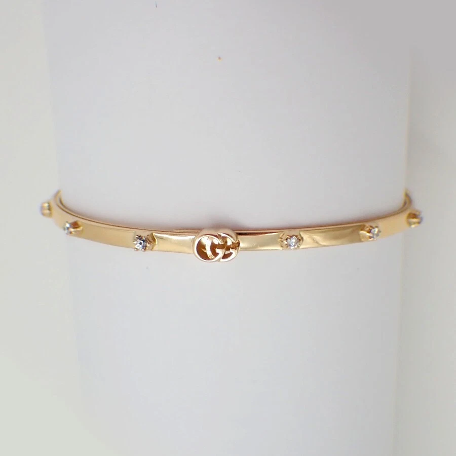 Bracelet Gucci Running G accents diamant or 18 carats taille 17