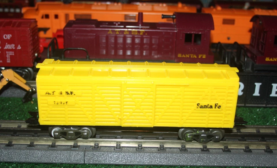 MARX ATSF Brown and Yellow Cattle Cars & Erie Flat Car with Rails - SOLD AS IS - Image 2 of 4