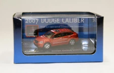 bc Ricko 38869 - 2007 Dodge Caliber HO 1:87 scale orange