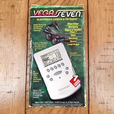 Vegas Seven Electronic Casino Handheld Game & FM Radio(no Headphones)