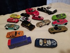 Collection of 16 mini cars. These are small, die-cast and plastic toy cars