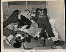 1966 Press Photo Dunning Family Asleep on Floor of Service Area During Snowstorm