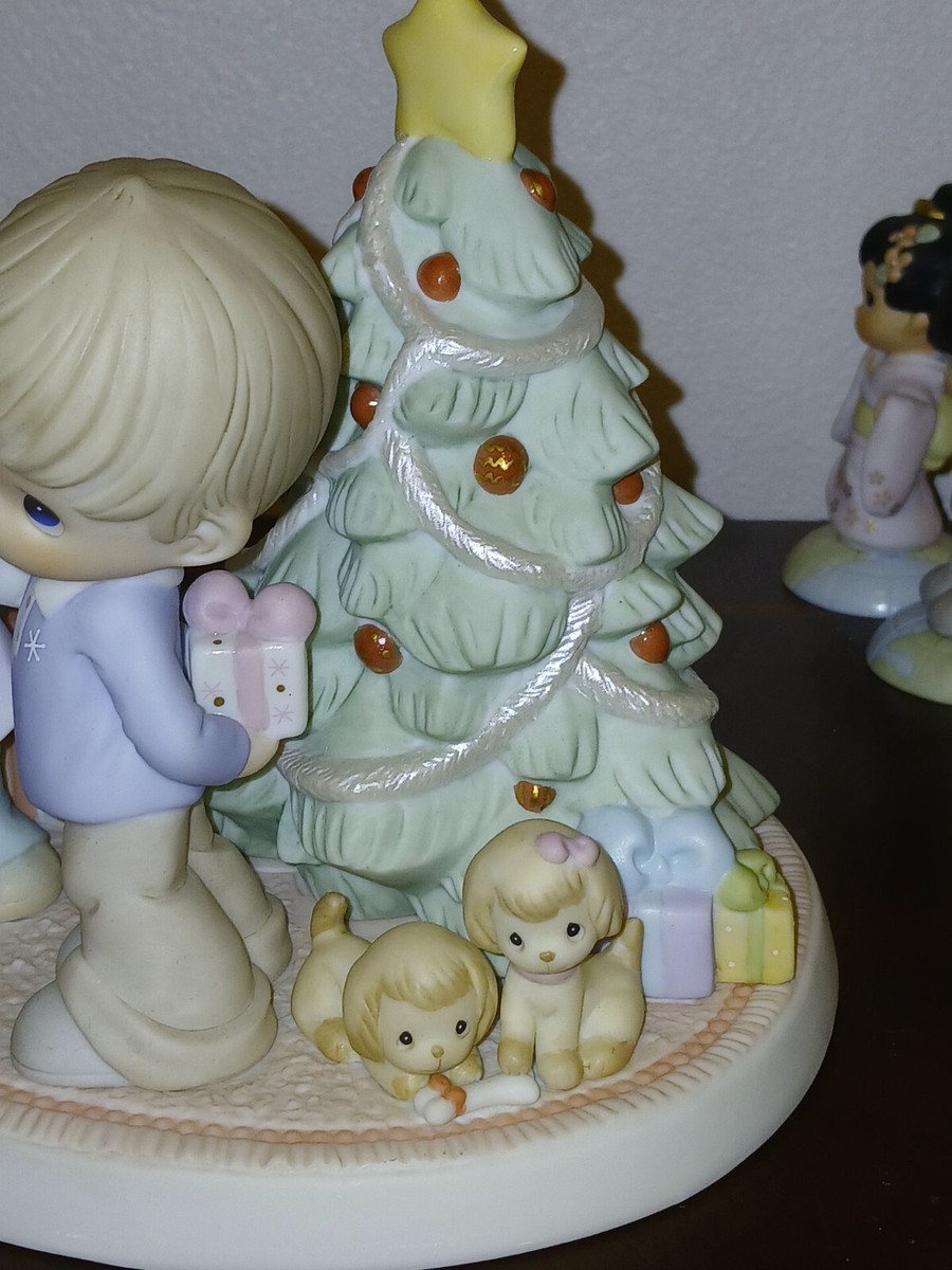 Precious Moments Figurine 910052. “Holiday Surprises Are Filled