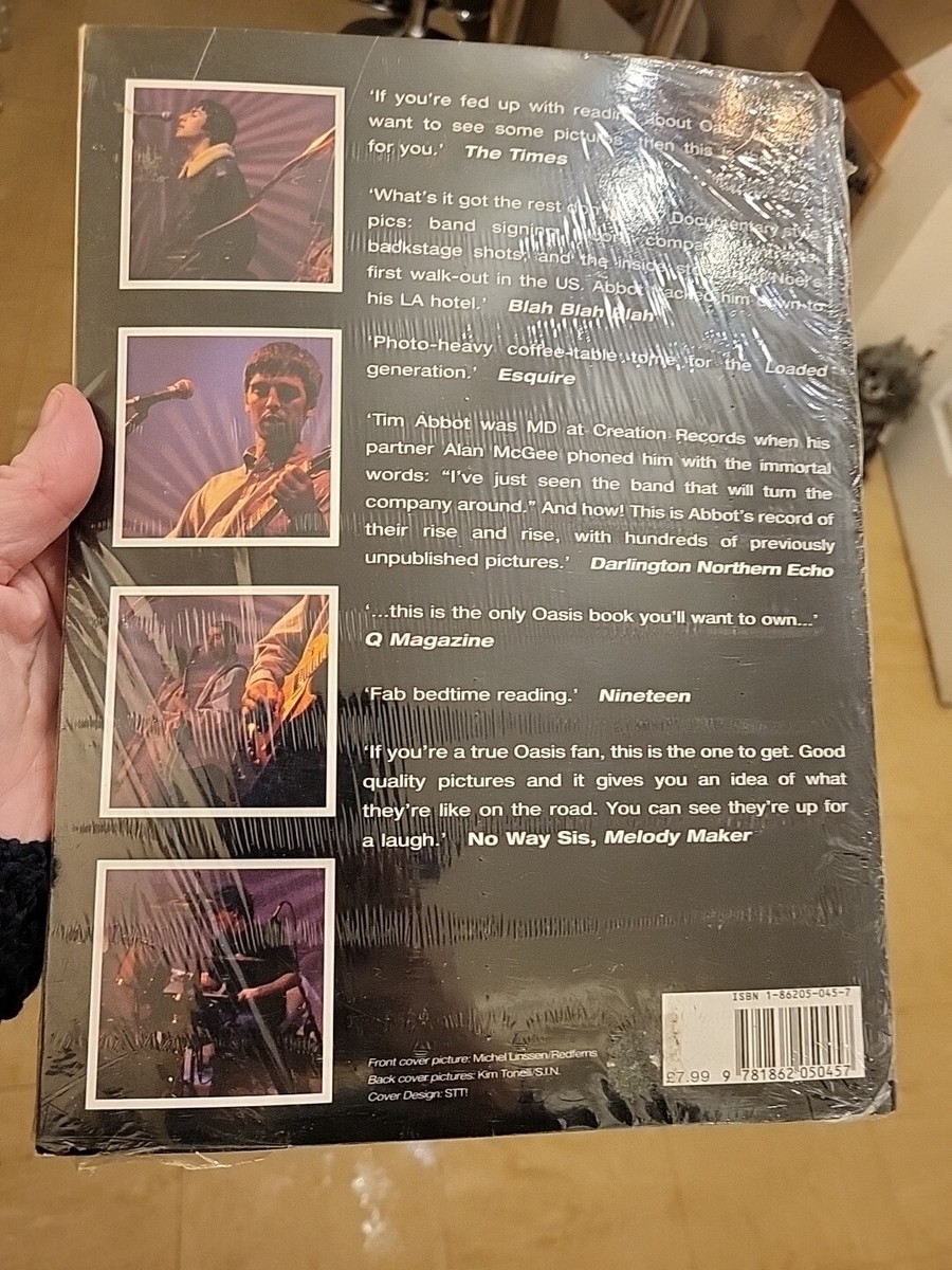 Book, 'Oasis definitely' By Tim Abbot. Still In Plastic Cover. VGC