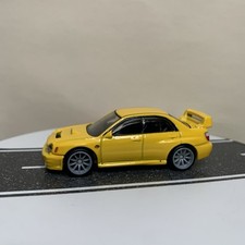 Hot Wheels Premium Thrill Climbers Subaru Impreza WRX Bugeye Yellow 1:64 NM