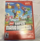 Nintendo New Super Mario Bros. Wii Multiplayer E 2009 NTSC-U/C Wii Mario