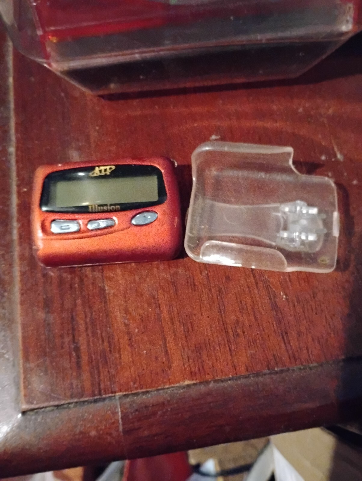 Vintage working red pager with case and non-working spare pager