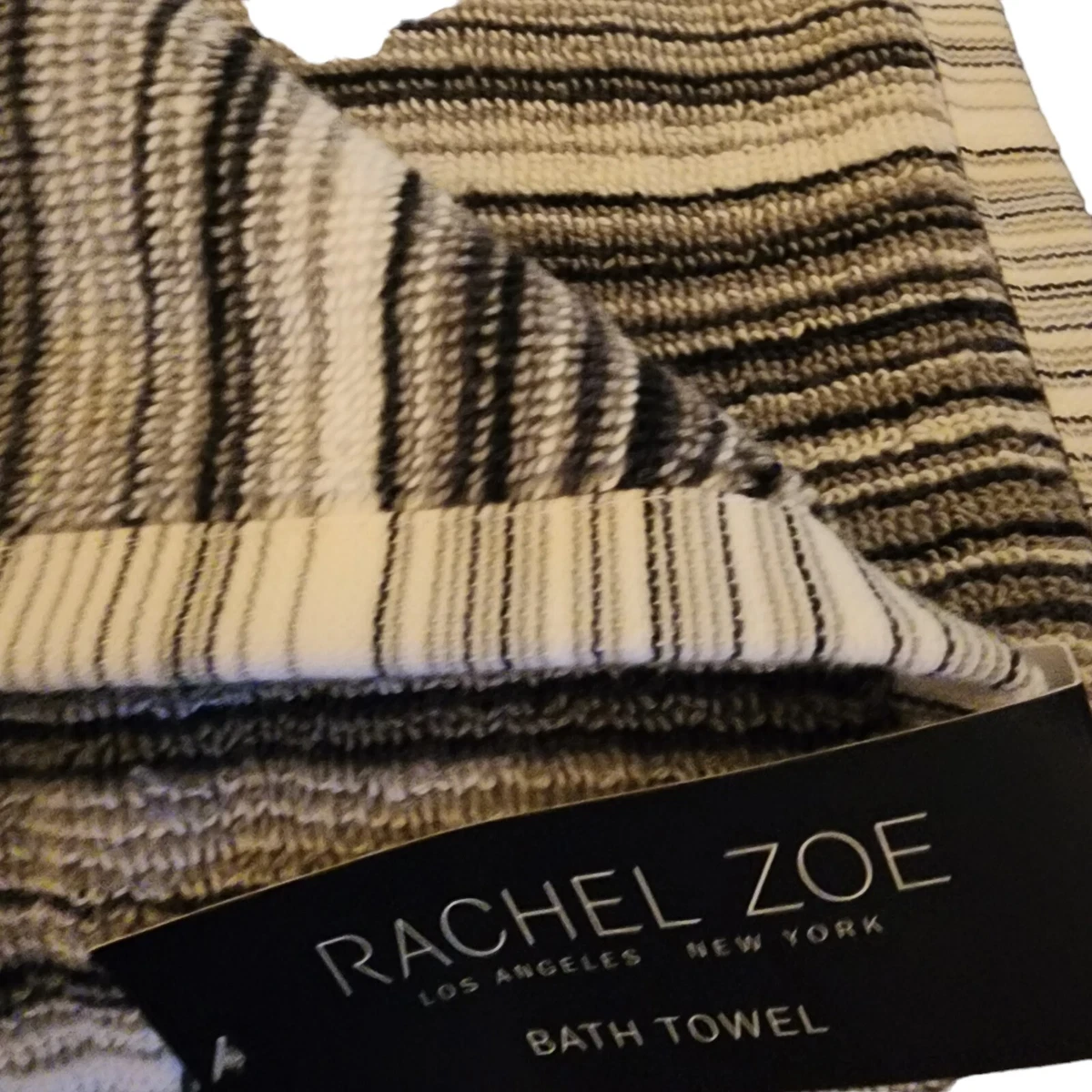 Tan and black bath towels sales