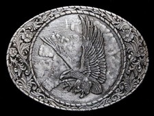 ND17107 VINTAGE 1982 BALD EAGLE FLORAL ORNAMENTAL BELT BUCKLE