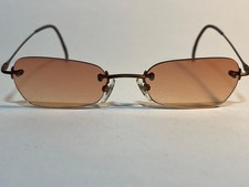 Calvin Klein CK 522S 70R Rimless Sunglasses Titanium Frame Brown Tint NOS Vintag