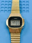 VTG Timex Quartz K Cell LCD Digital Watch Gold Tone Case Stainless Band strap