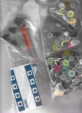 sewing supplies2 bag of buttons, 2 boxes snaps,3 tracing wheel ,good condition