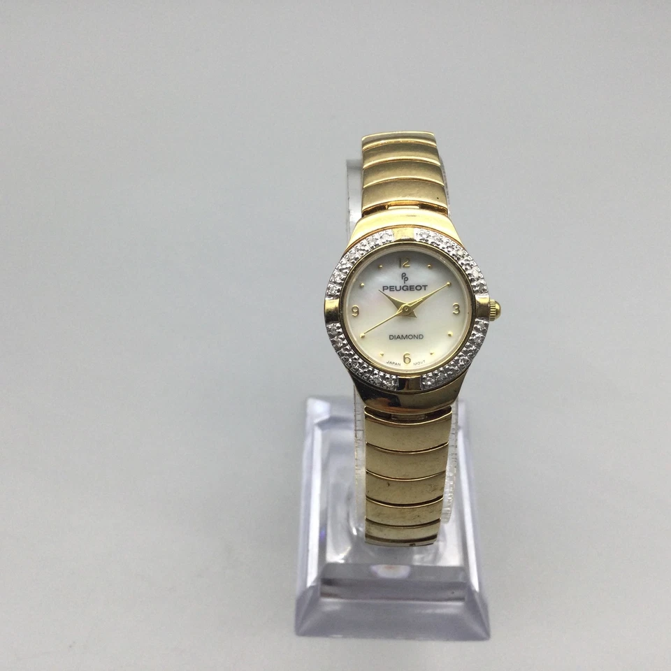 Reloj Peugeot Diamante Mujer 22mm Tono Dorado Cuadrante MOP Batería Nueva 6.25" Foto 2 de 4