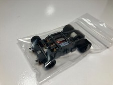 TYCO NOS 440 MAGNUM  NARROW chassis with  BLACK WHEELS  BRAND NEW  MINT