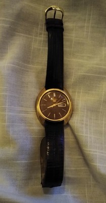 seiko 5 running fast