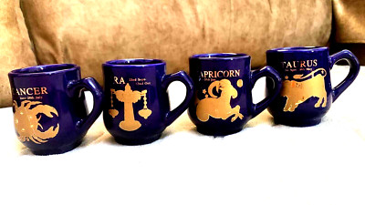 Small Cups With Zodiac Signs Drawn On Them, Four Cups