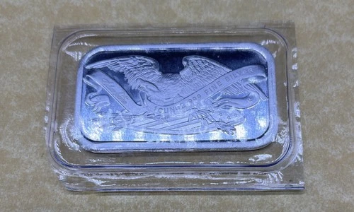 SEALED SILVERTOWNE AMERICAN EAGLE SHIELD AND ARMS ONE OZ .999 FINE SILVER  BAR